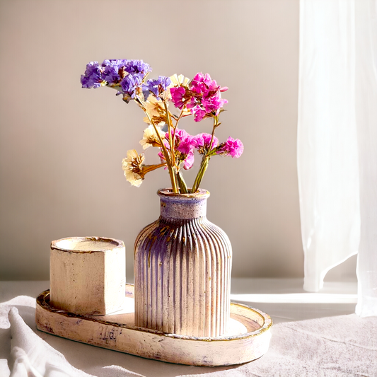 Rustic home decor, a bud vase, a hexagon tray, an oval tray and a candle holder on a white background