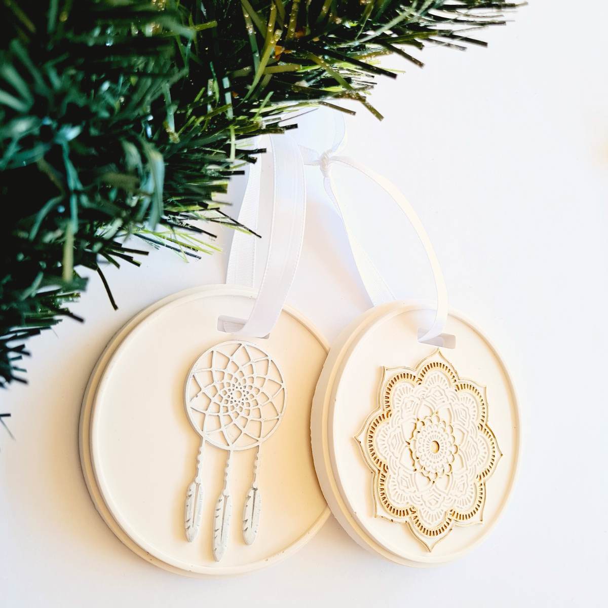 Two Bohemian Style Christmas Ornaments On a White Background