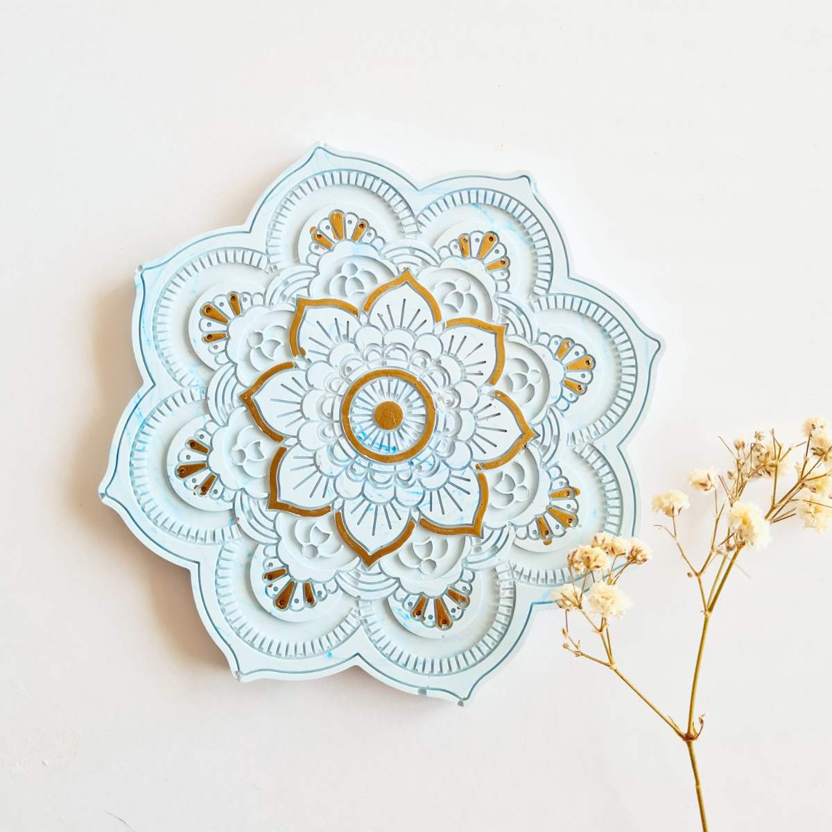 Flower shape blue and gold mandala ring dish/ coaster on white background