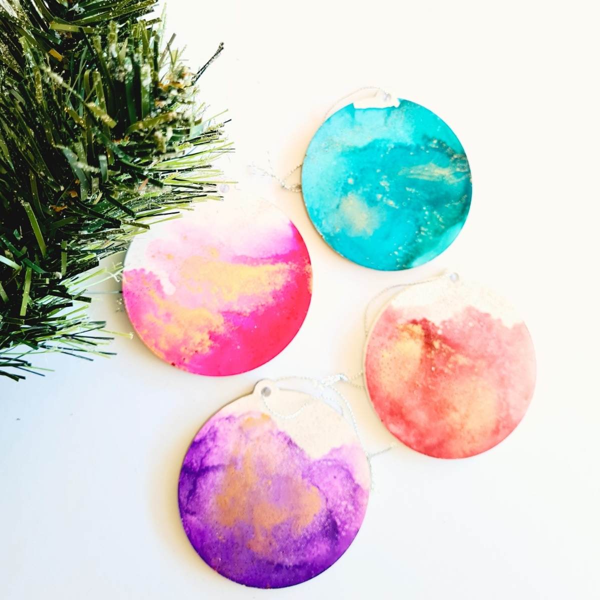 foud colorful handmade charismas tree decoration - bauble on white background