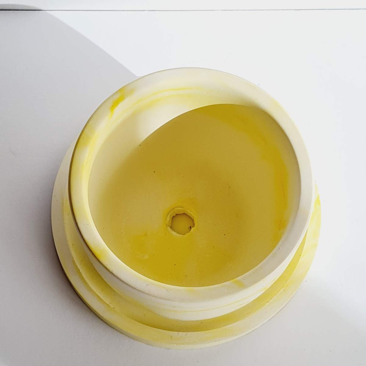 yellow handmade plant pot and saucer for small plants