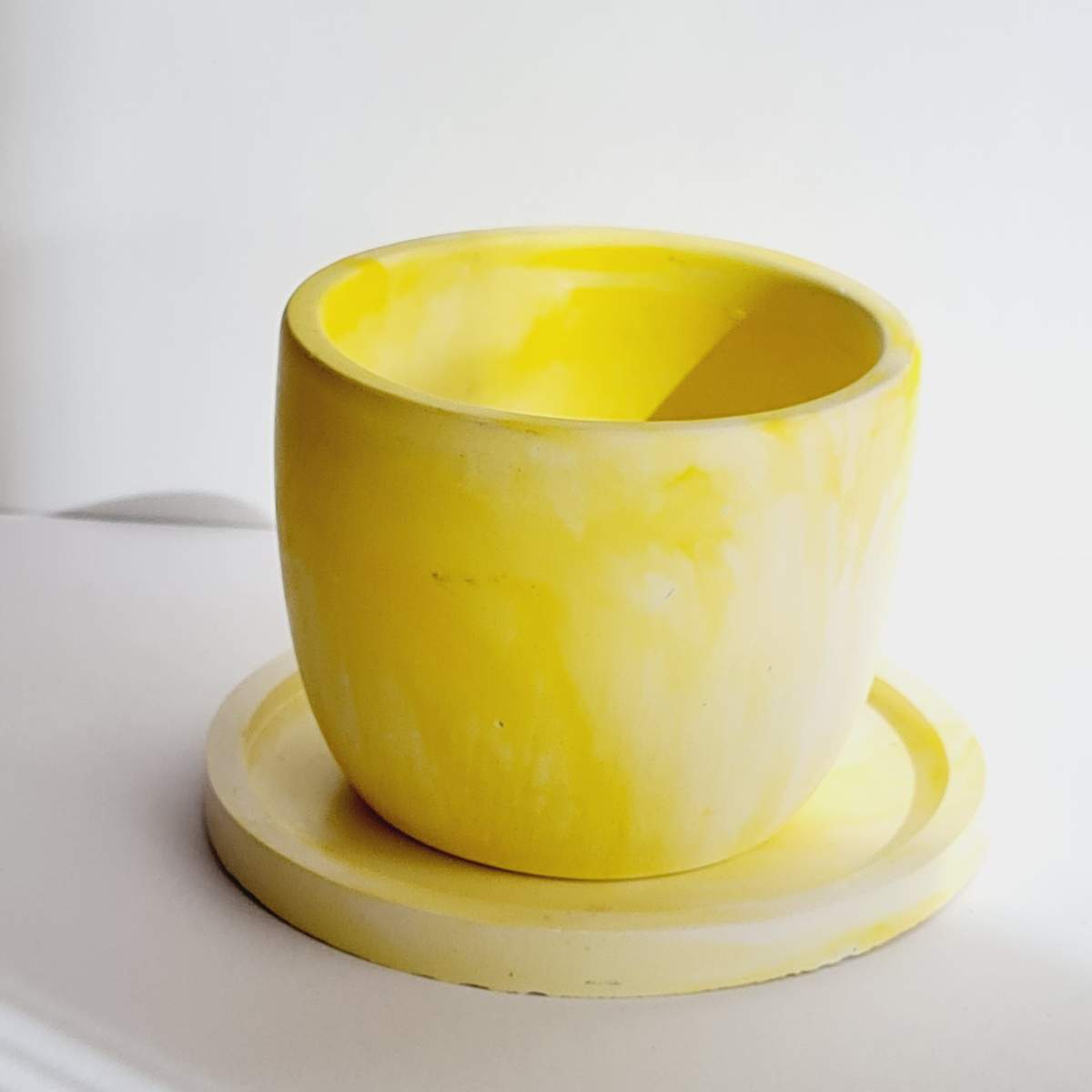 yellow handmade plant pot and saucer for small plants